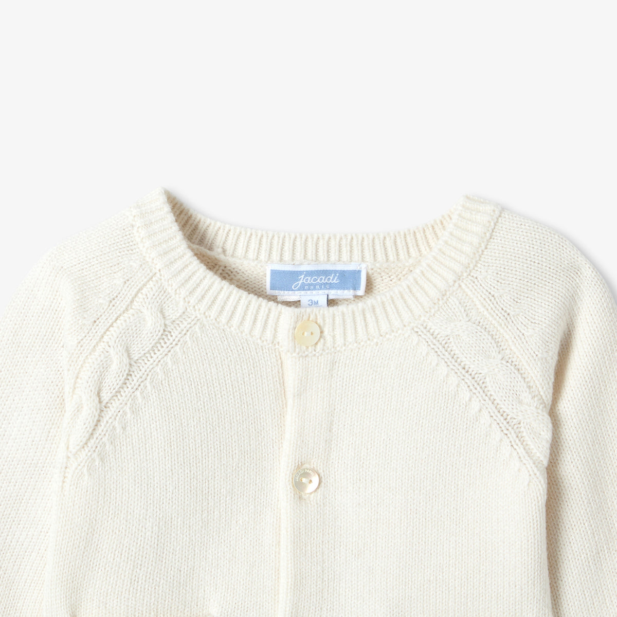 Baby jersey cardigan with cable-knit details